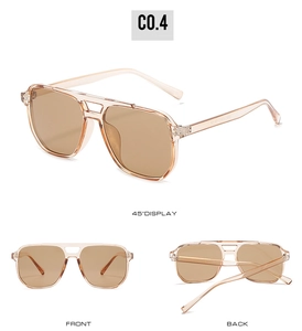 Detail view of double-bridge aviator sunglasses in light brown frame and lenses