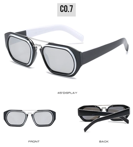 Detail view of square sunglasses with silver double bridge and black-white frame