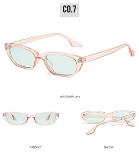 Lunettes de soleil œil de chat, monture rose et verres verts, angles multiples