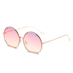 Lunettes de soleil rondes oversize à strass avec verres dégradés roses élégants