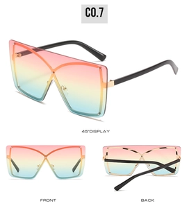 Three views of oversized shield sunglasses with rainbow gradient lenses and gold bridge