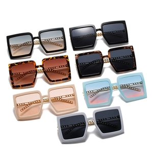 Oversized square sunglasses in 7 colors featuring stylish gold chain detail on the temples