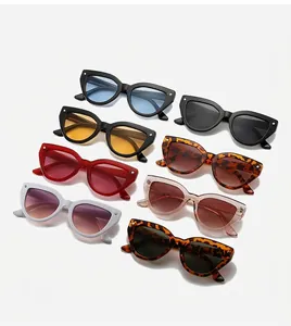 Detail view of cat-eye sunglasses collection with metal rivets in eight fashionable colors
