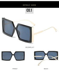 Détails de lunettes de soleil carrées oversize avec monture noire et branches dorées