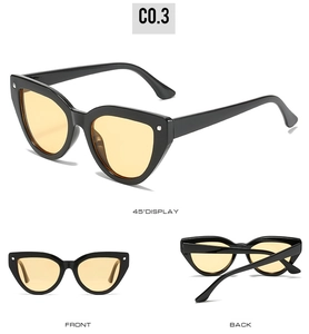 Three-view display of black cat eye sunglasses with yellow lenses and silver rivets