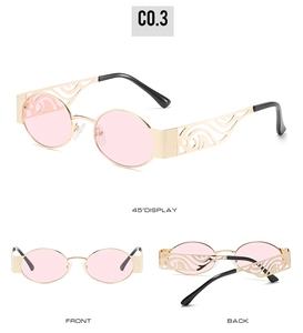 Detail of round sunglasses with pink lenses and gold frames featuring hollow cloud temples