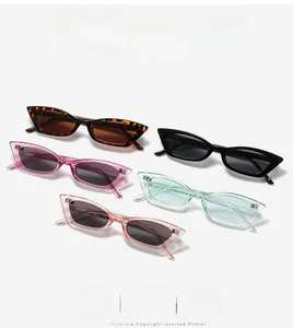 Detailed flat lay of small cat eye sunglasses in various jelly colors and tortoiseshell