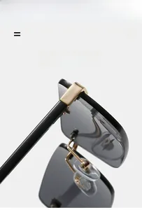Close-up of the square rimless sunglasses showing flexible hinges and lightweight PC temples