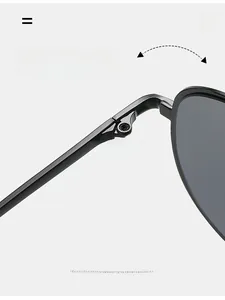 Macro detail of a durable metal hinge on black retro aviator sunglasses for smooth folding