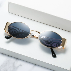 Oval gold metal sunglasses with M514 code and purple wave patterns on dark lenses
