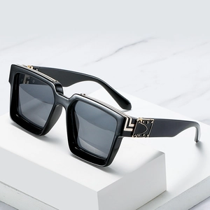 Oversized square sunglasses in black acetate with stylish gold metal temple details