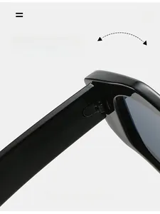 Macro view of durable metal hinges and model M324 size specs on black cat-eye sunglasses