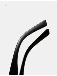 Detailed macro view of matte black curved temple legs for comfortable ergonomic fit