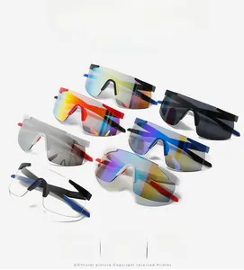 Multiple colorful sports cycling sunglasses with wide panoramic lenses in a professional layout