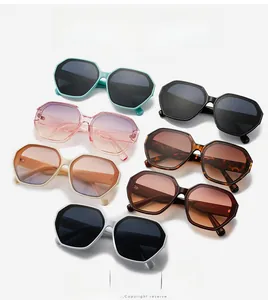 Flat lay of colorful octagonal sunglasses with wavy temples in diverse fashion shades