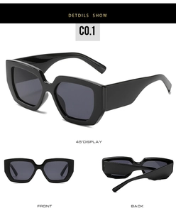 Detailed views of vintage chunky square sunglasses with thick black frames and grey lenses