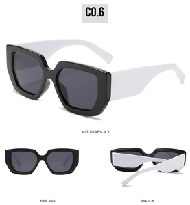 Three-angle display of vintage square sunglasses with black frames and wide white legs