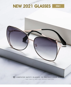 Macro shot of rose gold polygon sunglasses with gradient purple lenses and cutout metal sides