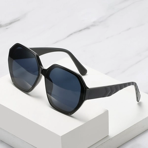 Irregular octagonal oversized sunglasses with unique wavy temples and dark polarized lenses