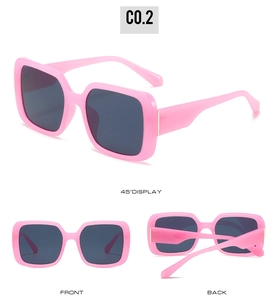 Three-way view of pink square oversized sunglasses with dark lenses and gold trim