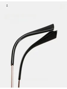 Close-up of curved metal glasses temples with black tips for comfortable wearing