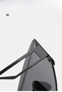 Detailed close-up of high-quality metal hinges and lightweight frame on oversized sunglasses