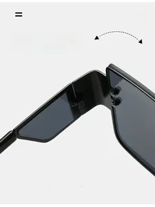 Detail shot of durable texture hinges on oversized square frame black sunglasses