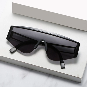 Minimalist oversized square flat top sunglasses with seamless frame in matte black