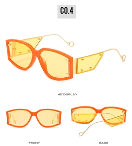 Trois vues de lunettes de soleil orange oversize avec verres jaunes et branches en métal