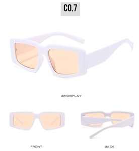 Vue triple de lunettes de soleil blanches à monture épaisse avec verres oranges