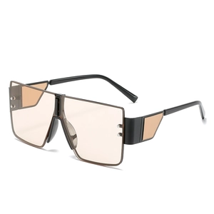 Oversized square sunglasses with champagne lenses and bold black temples, 45-degree view