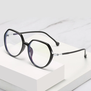 Classic black TR90 anti-blue light glasses with oversized hexagonal frame on a white pedestal