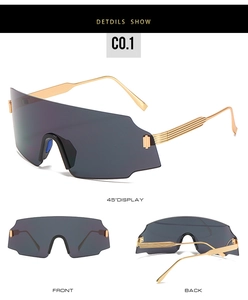 Three views of oversized cycling sunglasses with gold metal temples and grey lenses