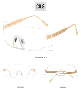 Three-angle view of oversized rimless cycling sunglasses with gold textured metal temples