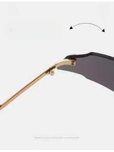 Detail of durable golden metal hinge and grey lens on outdoor cycling sunglasses