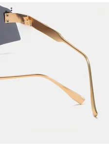 Detail of curved golden metal mirror legs with precision screws on outdoor cycling glasses