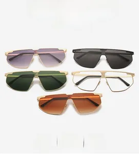 Detailed display of trendy oversized metal sunglasses in various gradient lens colors