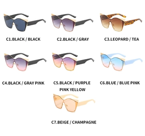 Selection of oversized cat eye sunglasses with gold lace metal trim in seven colors