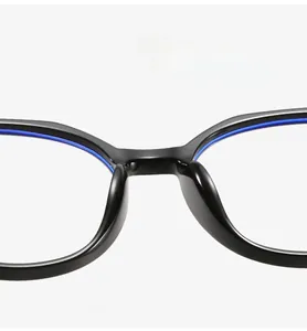 Detail of comfortable integrated nosepads on black glasses frame with blue accents