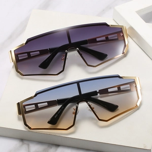 Futuristic oversized punk shield sunglasses with gradient lenses and gold metallic frames