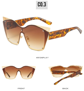 Three-view display of cat-eye sunglasses with tortoiseshell temples and gold accents