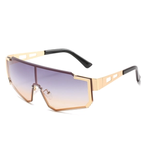 Futuristic oversized shield sunglasses with purple gradient lens and gold geometric arms