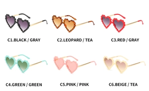 Detailed grid of scalloped heart-shaped sunglasses for kids in six vibrant colors