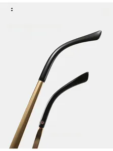 Detail of ergonomic curved metal temples with black tips for children's sunglasses