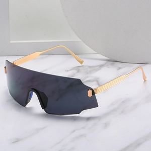 Fashionable oversized wrap-around cycling sunglasses with dark grey lenses and gold metal arms