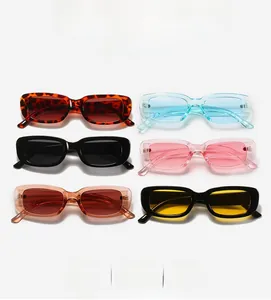 Flat lay of retro square sunglasses for kids in diverse colors and thick frames