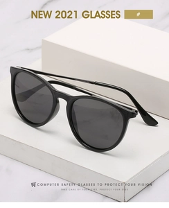 Classic black oversized sunglasses on white geometric stone with UV eye protection lens