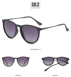 Three perspectives of matte black polarized sunglasses with purple gradient lenses
