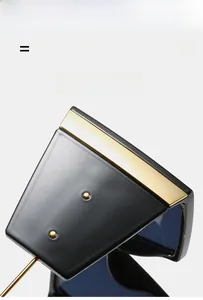Detailed view of lightweight square sunglasses with gold metal trim and elastic frame