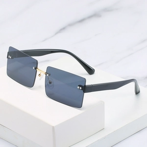 Fashionable square rimless sunglasses with blue lenses and black temples for women